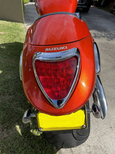 Load image into Gallery viewer, Tail Light Cover "New Tech Glide" Chrome fits Suzuki M1800 Intruder  - Highway Hawk H663-113
